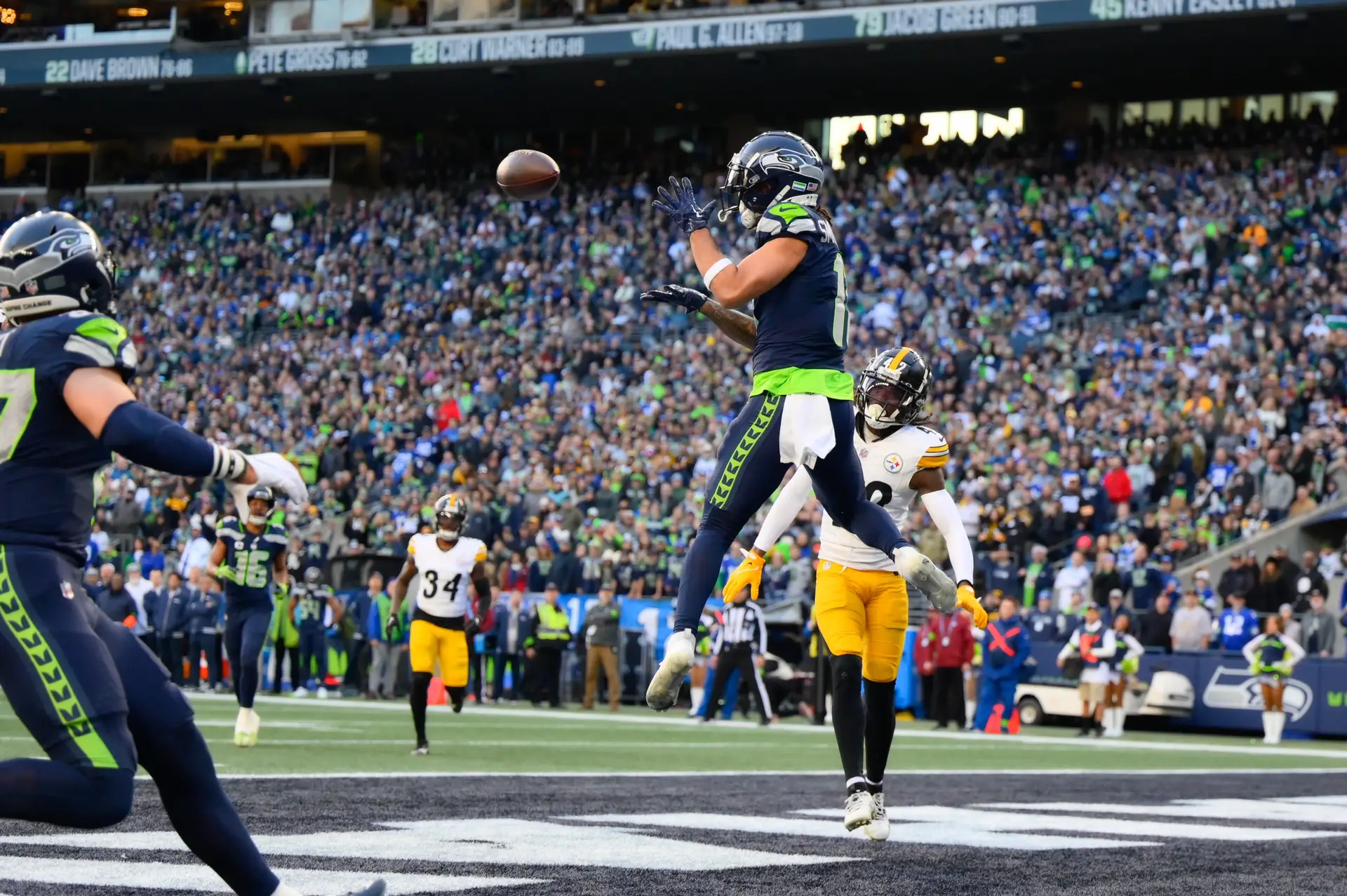 Dec 31, 2023; Seattle, Washington, USA; Seattle Seahawks wide receiver Jaxon Smith-Njigba (11) catches a pass for a touchdown against the Pittsburgh Steelers during the first half at Lumen Field. Mandatory Credit: Steven Bisig-USA TODAY Sports