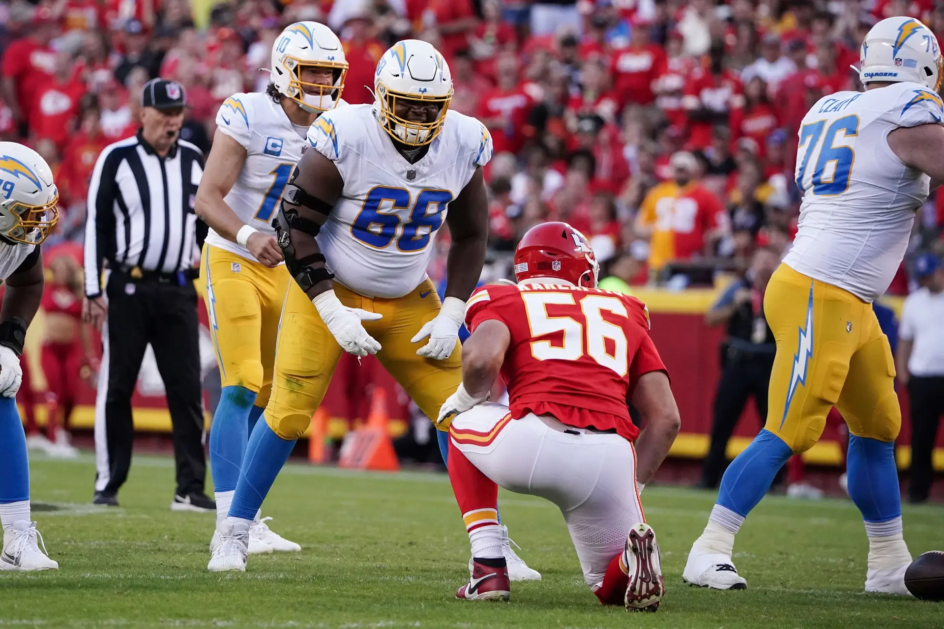 Oct 12, 2023; Kansas City, Missouri, USA; Los Angeles Chargers guard Jamaree Salyer (68) lines up across from Kansas City Chiefs defensive end George Karlaftis (56) during the game at GEHA Field at Arrowhead Stadium. Mandatory Credit: Denny Medley-USA TODAY Sports
