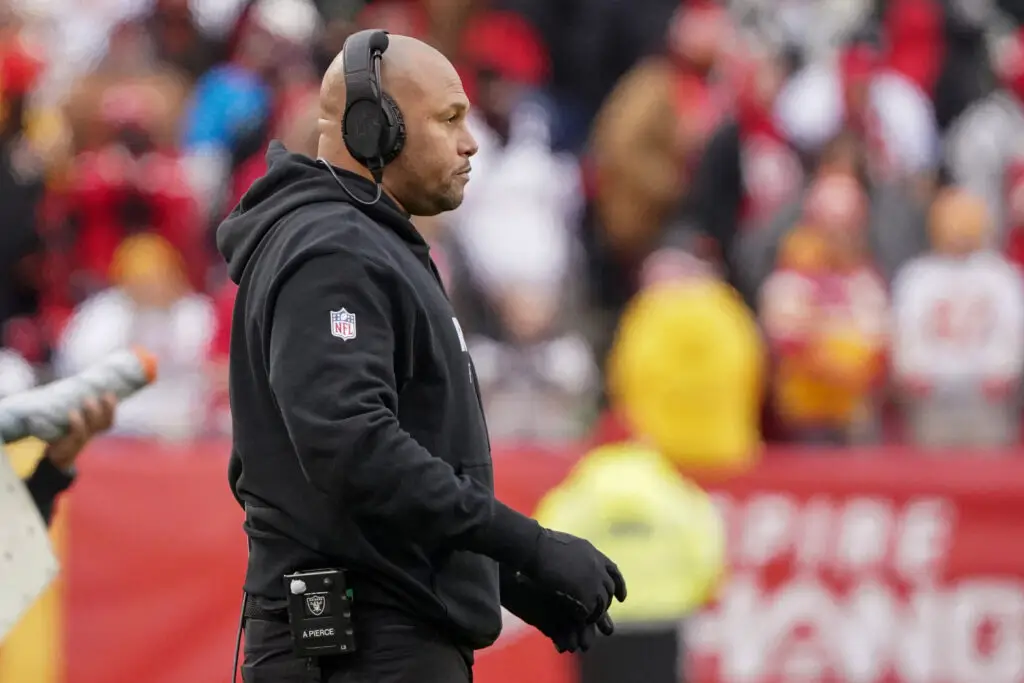 Dec 25, 2023; Kansas City, Missouri, USA; Las Vegas Raiders interim head coach Antonio Pierce watches play against the Kansas City Chiefs during the game at GEHA Field at Arrowhead Stadium. Mandatory Credit: Denny Medley-USA TODAY Sports