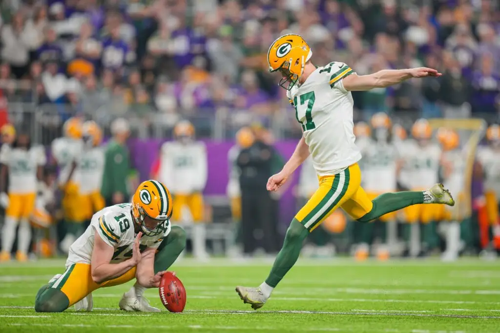 Dec 31, 2023; Minneapolis, Minnesota, USA; Green Bay Packers place kicker Anders Carlson (17) kicks a field goal against the Minnesota Vikings in the first quarter at U.S. Bank Stadium. Mandatory Credit: Brad Rempel-USA TODAY Sports