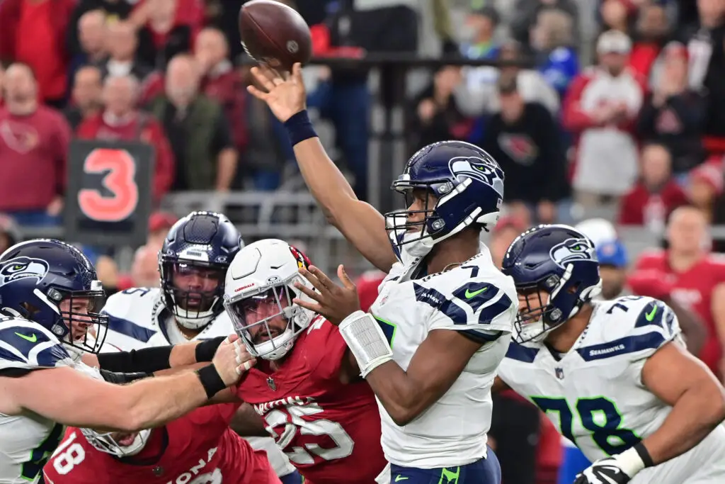 Jan 7, 2024; Glendale, Arizona, USA; Seattle Seahawks quarterback Geno Smith (7) throws in the second half against the Arizona Cardinals at State Farm Stadium. Mandatory Credit: Matt Kartozian-USA TODAY Sports