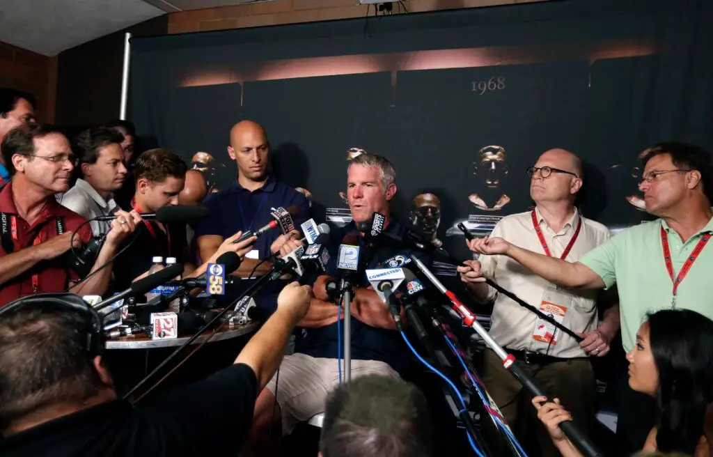 Aug 4, 2016; Canton, OH, USA; Former Green Bay Packers quarterback Brett Favre (left) talks with the media at a press conference for the NFL Hall of Fame Class of 2016. Mandatory Credit: Rick Wood/Milwaukee Journal Sentinel via USA TODAY Network