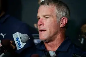 Aug 4, 2016; Canton, OH, USA; Former Green Bay Packers quarterback Brett Favre (left) talks with the media at a press conference for the NFL Hall of Fame Class of 2016. Mandatory Credit: Rick Wood/Milwaukee Journal Sentinel via USA TODAY Network