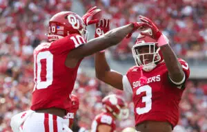 Oct 21, 2023; Norman, Oklahoma, USA; Oklahoma Sooners linebacker Kip Lewis (10) celebrates with Oklahoma Sooners defensive back Robert Spears-Jennings (3) during the first half against the UCF Knights at Gaylord Family-Oklahoma Memorial Stadium. Mandatory Credit: Kevin Jairaj-USA TODAY Sports