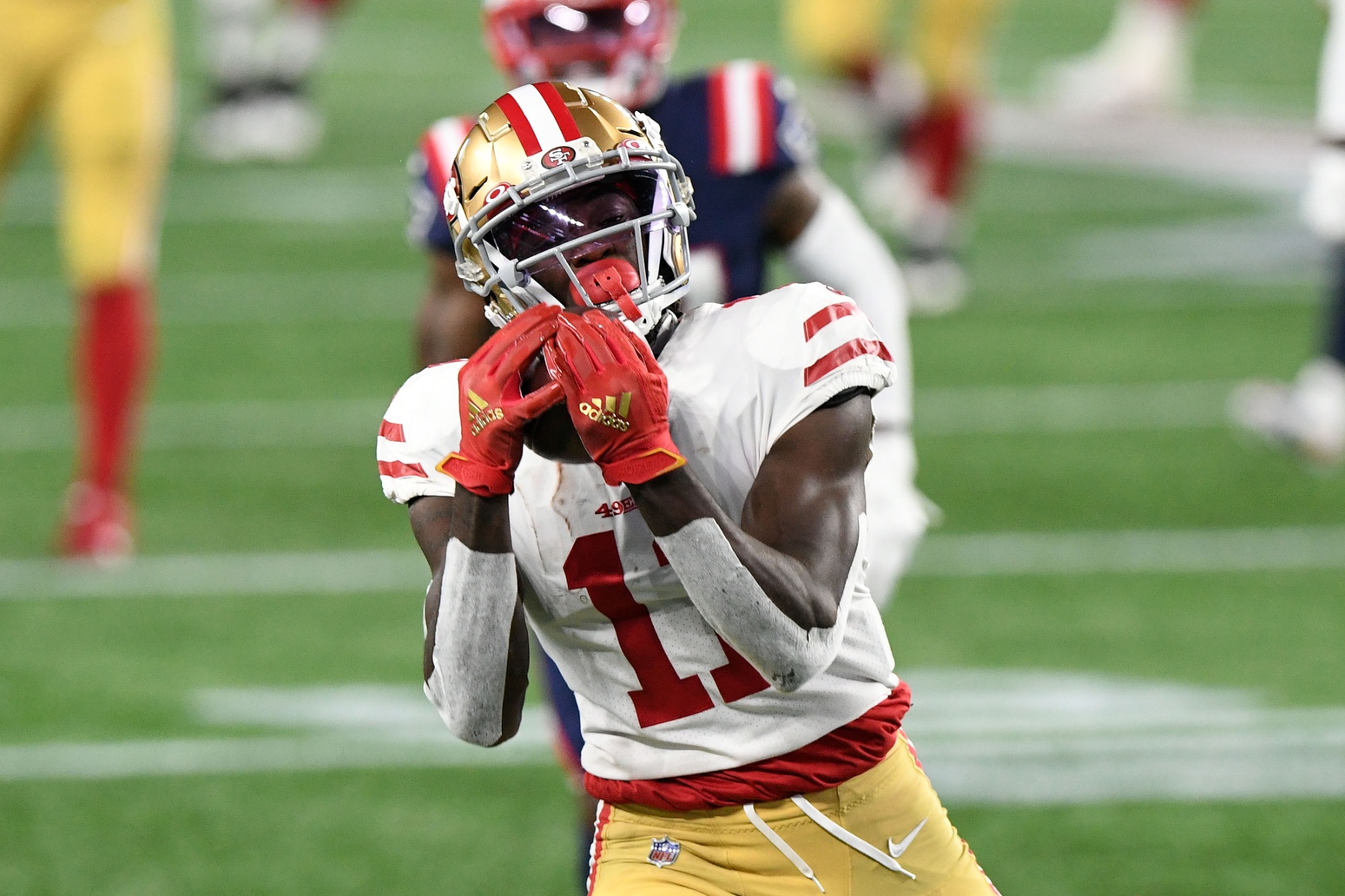 Oct 25, 2020; Foxborough, Massachusetts, USA; San Francisco 49ers wide receiver Brandon Aiyuk (11) makes a catch on a pass from quarterback Jimmy Garoppolo (not seen) during the second half against the New England Patriots at Gillette Stadium. Mandatory Credit: Brian Fluharty-USA TODAY Sports