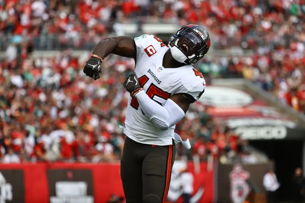 Jan 16, 2022; Tampa, Florida, USA;Tampa Bay Buccaneers inside linebacker Devin White (45) celebrates as he sacks Philadelphia Eagles quarterback Jalen Hurts (1) (not pictured) during the first quarter in a NFC Wild Card playoff football game at Raymond James Stadium. Mandatory Credit: Kim Klement-USA TODAY Sports