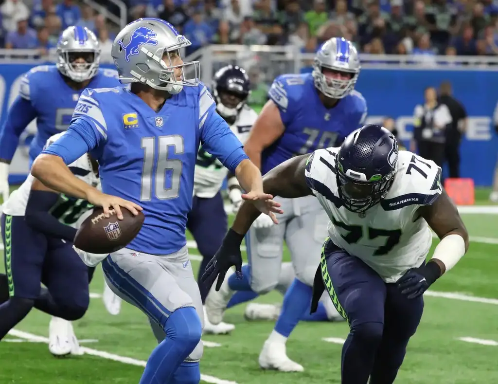 © KirtSeattle Seahawks defensive tackle Quinton Jefferson (77) rushes Detroit Lions quarterback Jared Goff (16) during the first half at Ford Field, Oct. 2, 2022. © Kirthmon F. Dozier / USA TODAY NETWORK F. Dozier / USA TODAY NETWORK