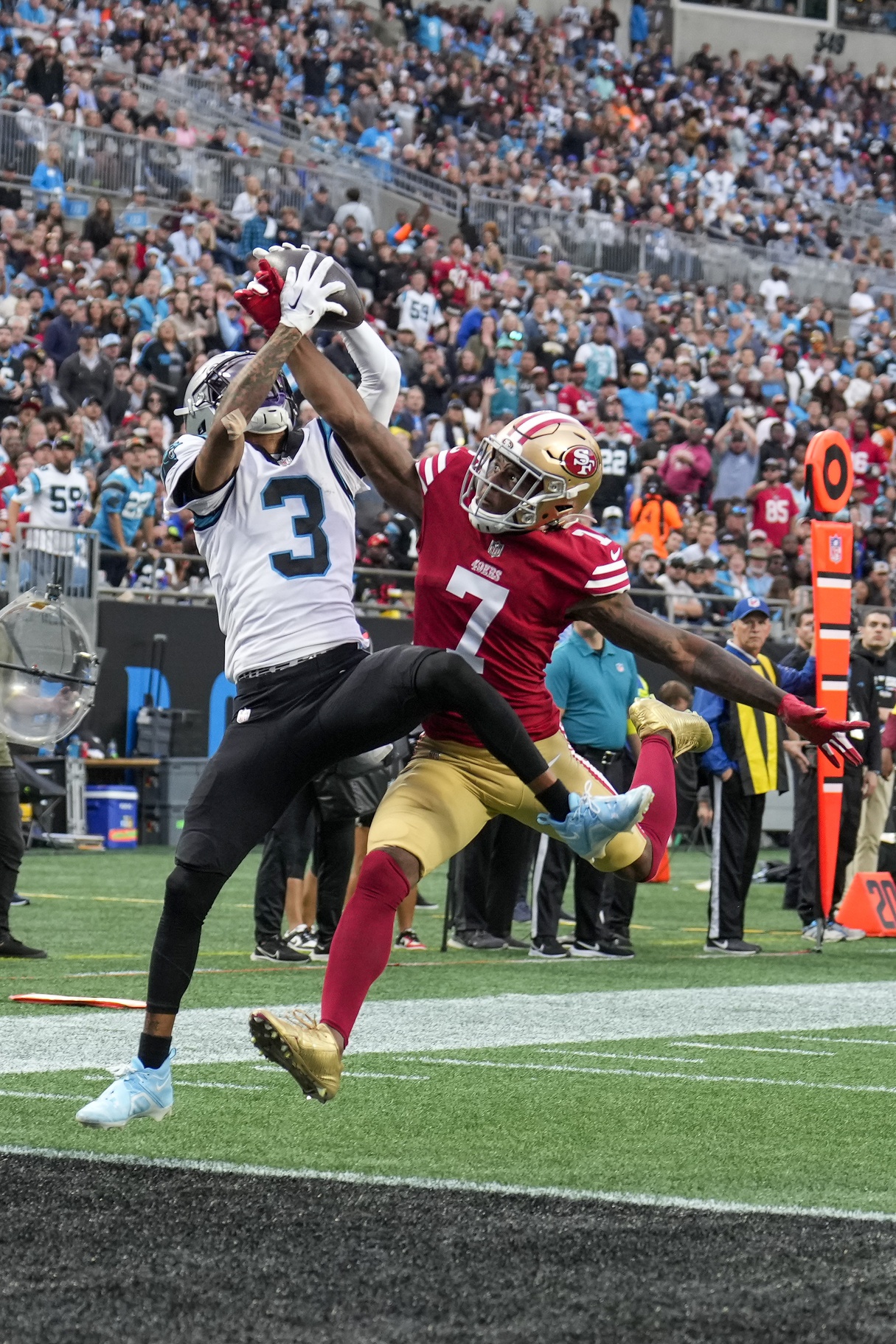 Oct 9, 2022; Charlotte, North Carolina, USA; San Francisco 49ers cornerback Charvarius Ward (7) breaks up a pass near the end zone to Carolina Panthers wide receiver Robbie Anderson (3) during the second half at Bank of America Stadium. Mandatory Credit: Jim Dedmon-USA TODAY Sports