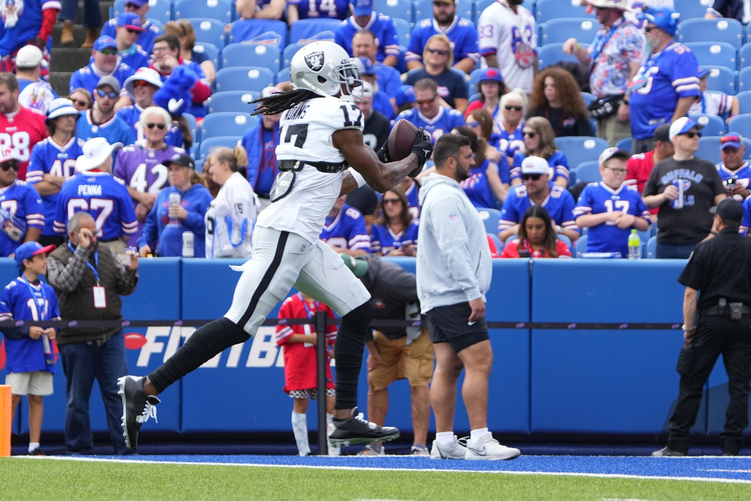 Sep 17, 2023; Orchard Park, New York, USA; Las Vegas Raiders wide receiver Davante Adams (17) warms up prior to the game against the Buffalo Bills at Highmark Stadium. Mandatory Credit: Gregory Fisher-USA TODAY Sports