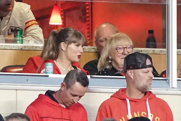 Oct 12, 2023; Kansas City, Missouri, USA; Recording artist Taylor Swift sits next to Travis Kelce s mom Donna watching warm ups against the Denver Broncos at GEHA Field at Arrowhead Stadium. Mandatory Credit: Denny Medley-USA TODAY Sports
