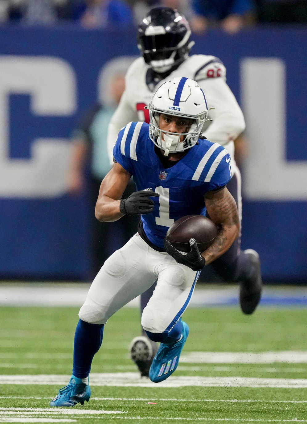 Indianapolis Colts wide receiver Josh Downs (1) rushes the ball Saturday, Jan. 6, 2024, during a game against the Houston Texans at Lucas Oil Stadium in Indianapolis. © Robert Scheer/IndyStar / USA TODAY NETWORK