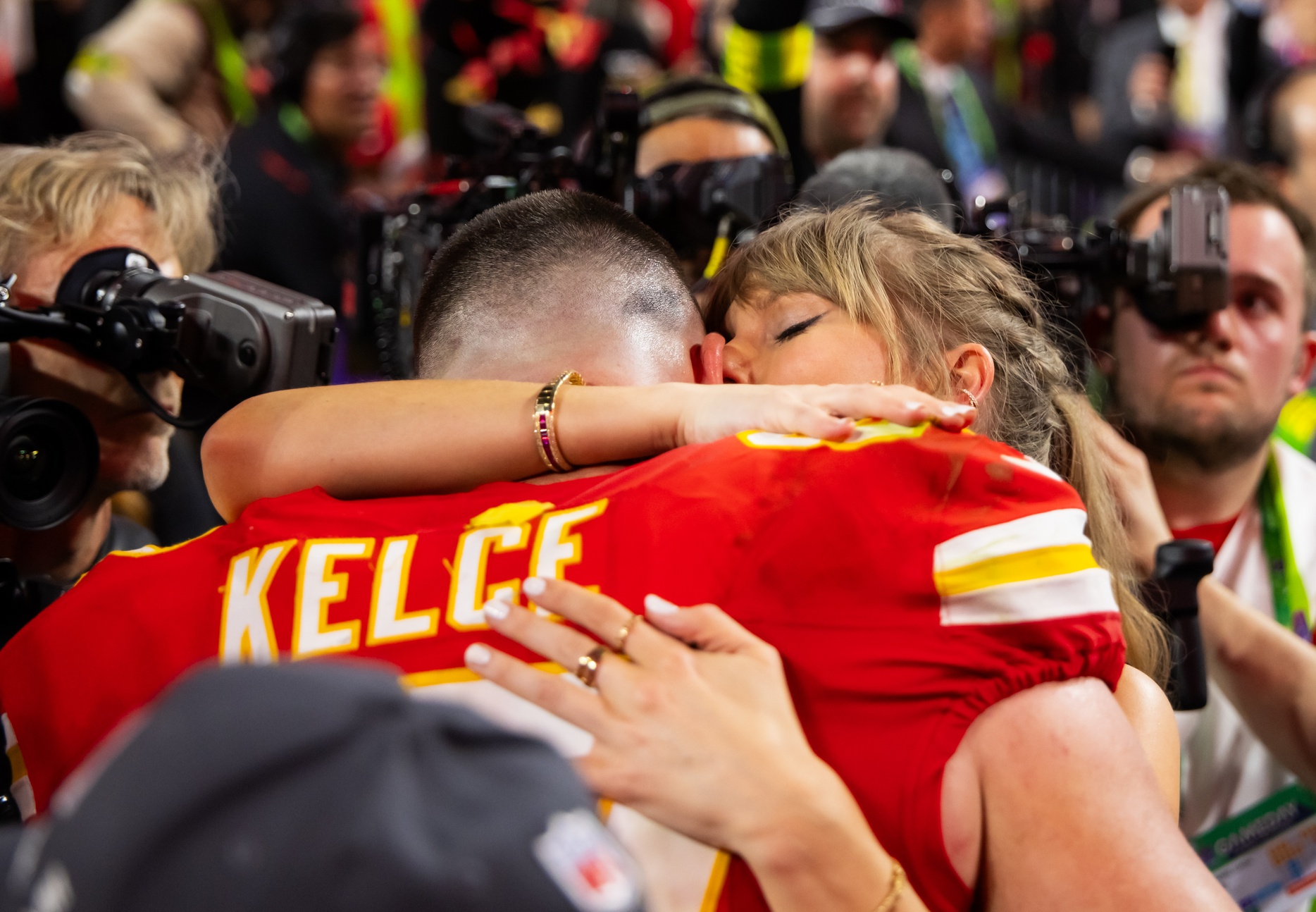 Feb 11, 2024; Paradise, Nevada, USA; Kansas City Chiefs tight end Travis Kelce (87) celebrates with girlfriend Taylor Swift after defeating the San Francisco 49ers in Super Bowl LVIII at Allegiant Stadium. Mandatory Credit: Mark J. Rebilas-USA TODAY Sports