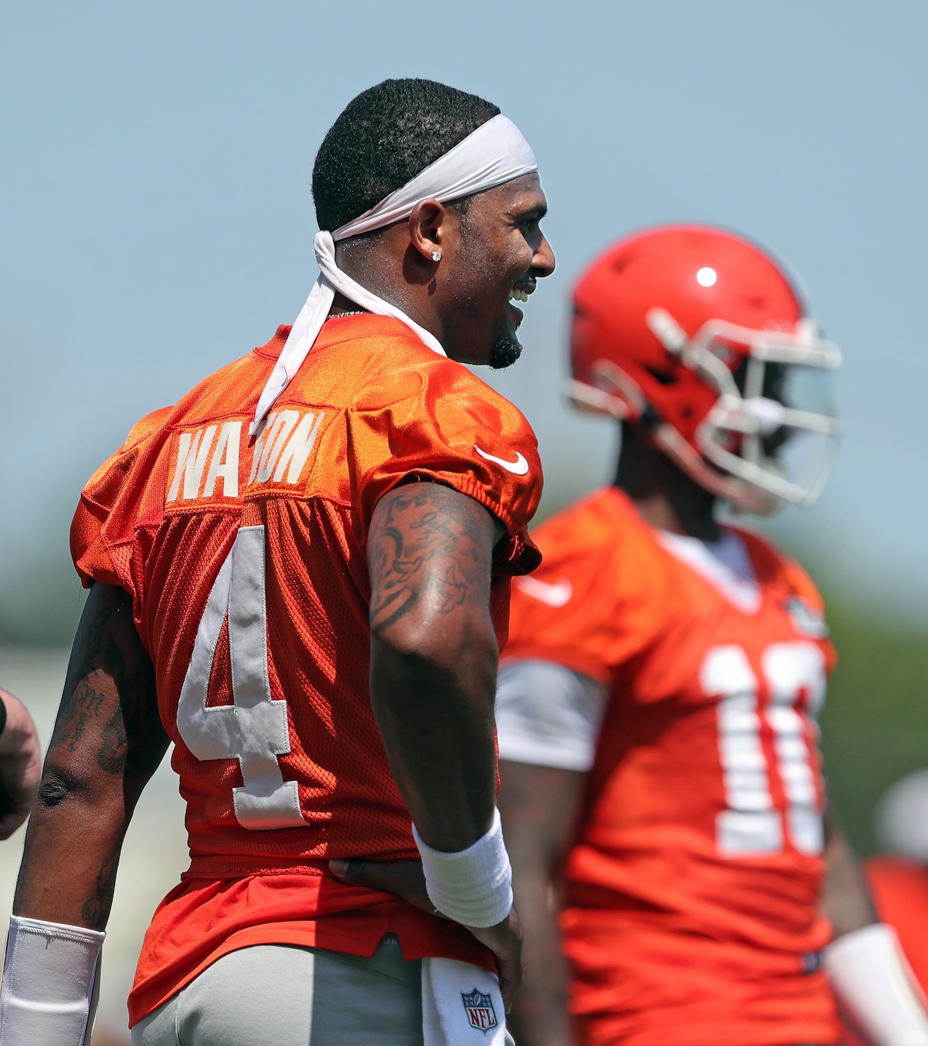 Cleveland Browns quarterback Deshaun Watson (4) laughs as he watches Tyler Huntley take reps during minicamp, Thursday, June 13, 2024, in Berea. © Jeff Lange / USA TODAY NETWORK