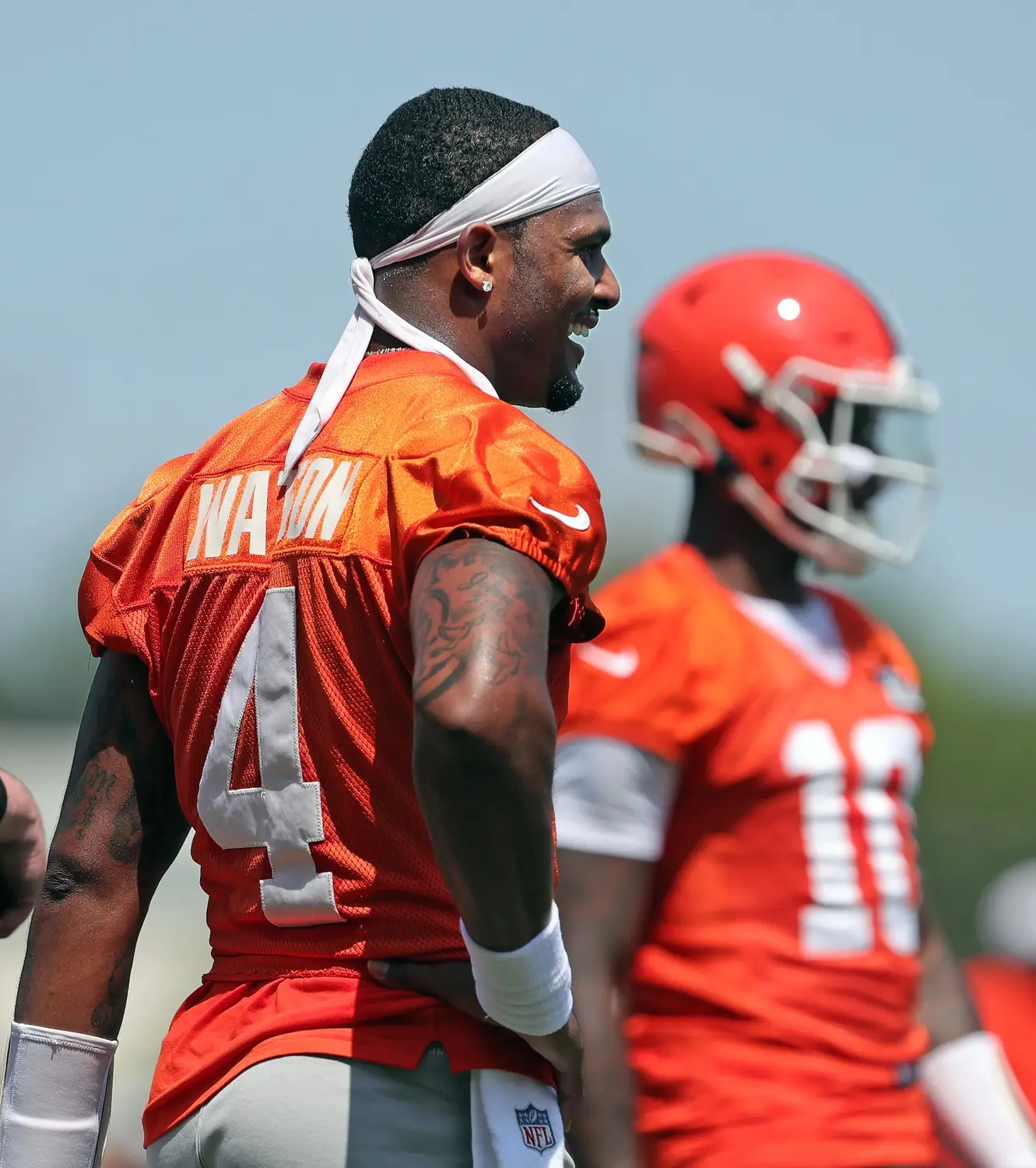 Cleveland Browns quarterback Deshaun Watson (4) laughs as he watches Tyler Huntley take reps during minicamp, Thursday, June 13, 2024, in Berea. © Jeff Lange / USA TODAY NETWORK