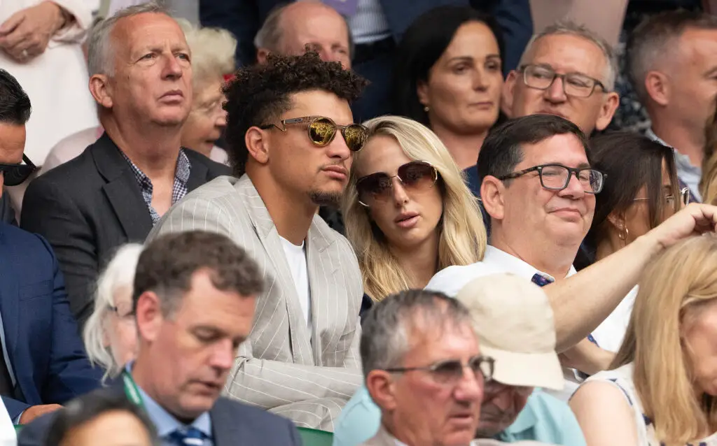 Jul 5, 2024; London, United Kingdom; Kansas City Chiefs quarterback Patrick Mahomes and wife Brittany Mahomes in attendance for the Carlos Alcaraz of Spain and Frances Tiafoe of the United States (both not shown) match on day five of The Championships at All England Lawn Tennis and Croquet Club. Mandatory Credit: Susan Mullane-USA TODAY Sports