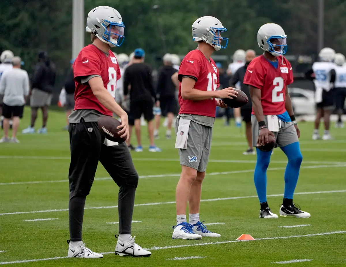 (L to R) Detroit Lions quarterbacks Nate Sudfeld, Jared Goff and Hendon Hooker line up for drills during practice at the Detroit Lions practice facility in Allen Park on Wednesday, July 24, 2024. © Eric Seals / USA TODAY NETWORK