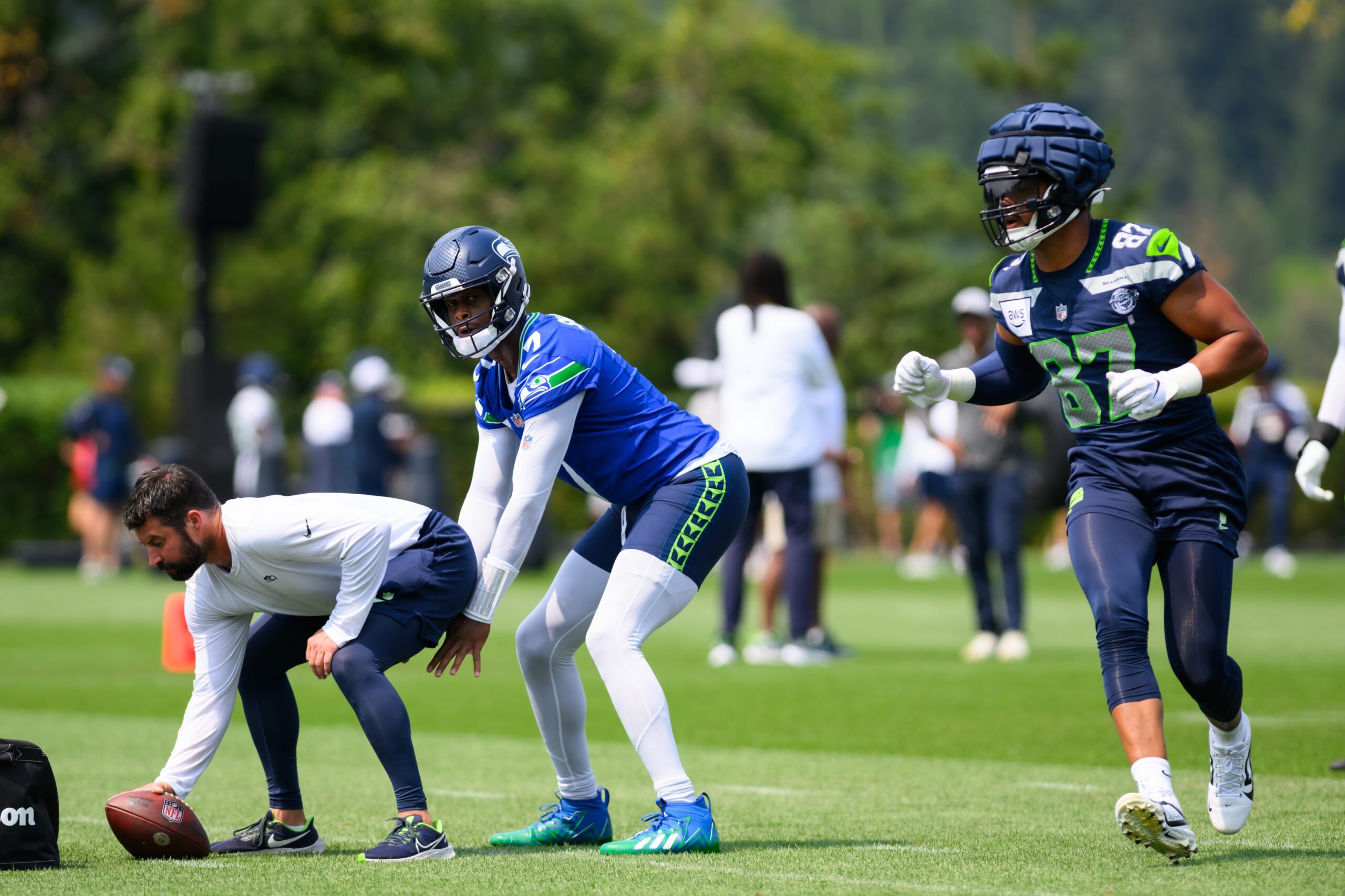 Jul 27, 2024; Renton, WA, USA; Seattle Seahawks quarterback Geno Smith (7) during training camp at Virginia Mason Athletic Center. Mandatory Credit: Steven Bisig-USA TODAY Sports