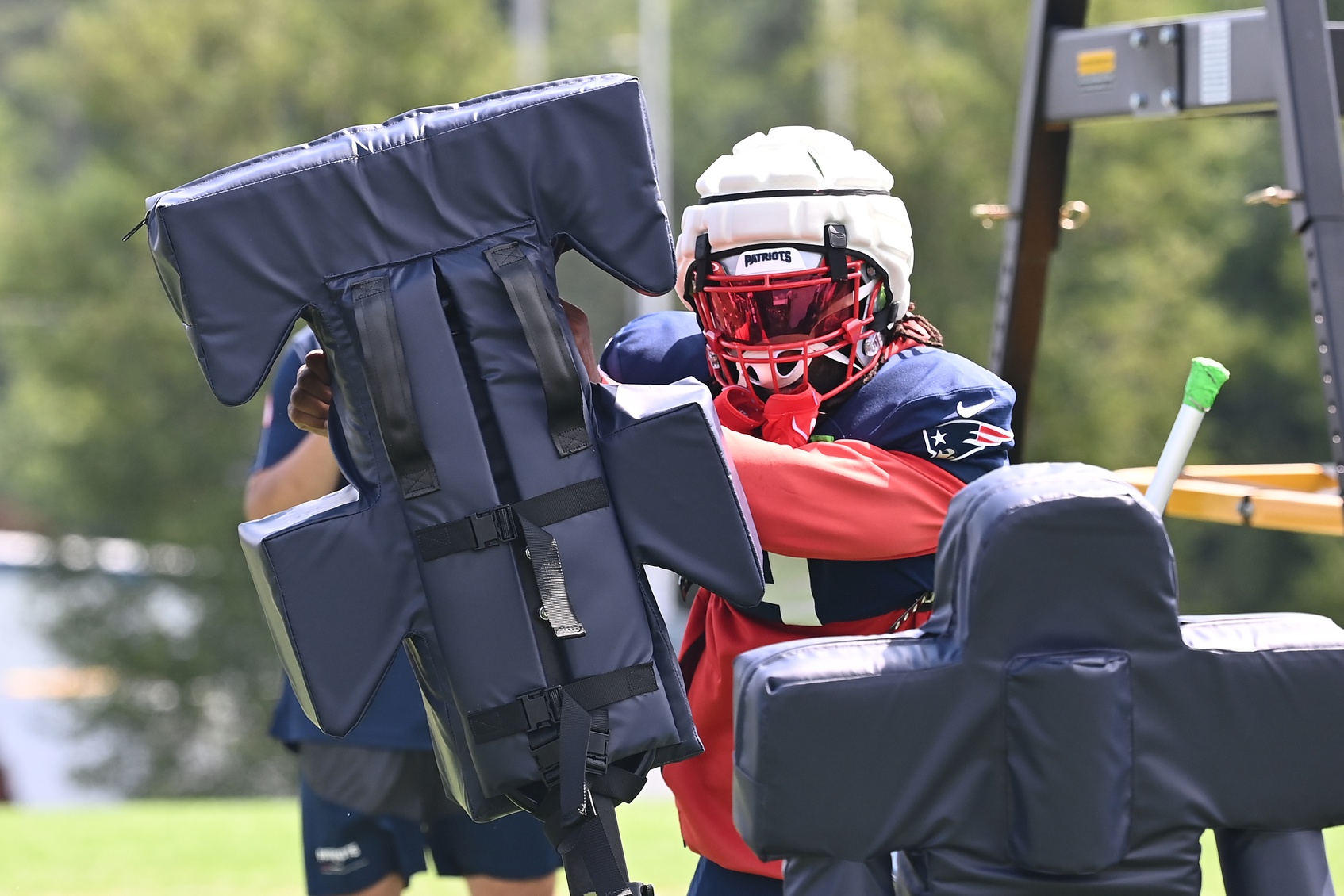 Aug 03, 2024; Foxborough, MA, USA; New England Patriots linebacker Matthew Judon (9) does a drill during training camp at Gillette Stadium. Mandatory Credit: Eric Canha-USA TODAY Sports