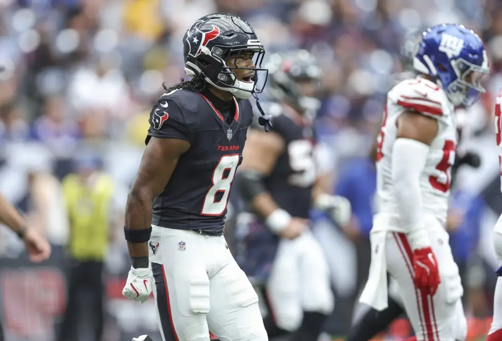 Aug 17, 2024; Houston, Texas, USA; Houston Texans wide receiver John Metchie III (8) shouts after scoring a touchdown during the second quarter against the New York Giants at NRG Stadium. Mandatory Credit: Troy Taormina-USA TODAY Sports (Dallas Chiefs)