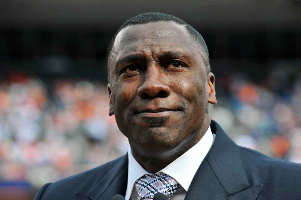 September 20, 2009; Denver, CO, USA; Former Denver Broncos tight end Shannon Sharpe (84) reacts during the ring of fame ceremony at half time against the Cleveland Browns at Invesco Field. The Broncos defeated the Browns 27-6. Mandatory Credit: Ron Chenoy-USA TODAY Sports