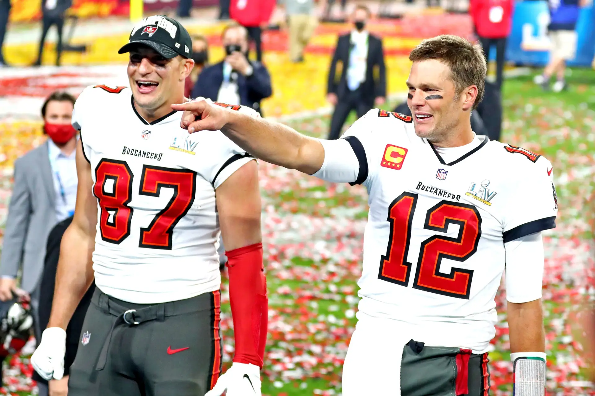 Feb 7, 2021; Tampa, FL, USA; Tampa Bay Buccaneers quarterback Tom Brady (12) and tight end Rob Gronkowski (87) celebrate after beating the Kansas City Chiefs in Super Bowl LV at Raymond James Stadium. Mandatory Credit: Mark J. Rebilas-Imagn Images (Patriots)