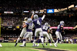 NFL Dec 2, 2021; New Orleans, Louisiana, USA; Dallas Cowboys quarterback Dak Prescott (4) passes the ball against New Orleans Saints during the second half at Caesars Superdome. Mandatory Credit: Stephen Lew-Imagn Images