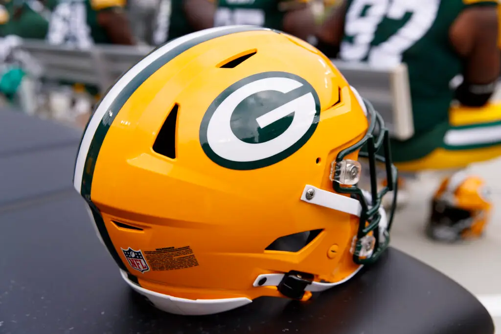 'Condolences To The Friends And Family': Former Green Bay Packers Coach Died Of Leukemia 1 Aug 26, 2023; Green Bay, Wisconsin, USA; A Green Bay Packers helmet sits on the sidelines during the game against the Seattle Seahawks at Lambeau Field. Mandatory Credit: Jeff Hanisch-Imagn Images