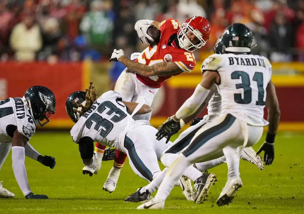 Nov 20, 2023; Kansas City, Missouri, USA; Kansas City Chiefs wide receiver Skyy Moore (24) is tackled by Philadelphia Eagles cornerback Bradley Roby (33) during the second half at GEHA Field at Arrowhead Stadium. Mandatory Credit: Jay Biggerstaff-Imagn Images