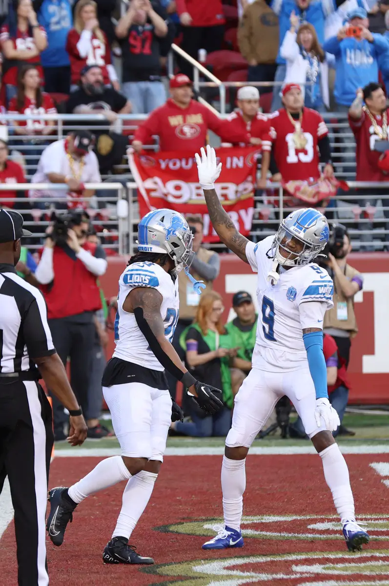 Lions running back Jahmyr Gibbs, left, celebrates with wide receiver Jameson Williams after scoring a touchdown in the second quarter of the NFC championship game at Levi's Stadium in Santa Clara, California, on Sunday, Jan. 28, 2024. © Eric Seals / USA TODAY NETWORK