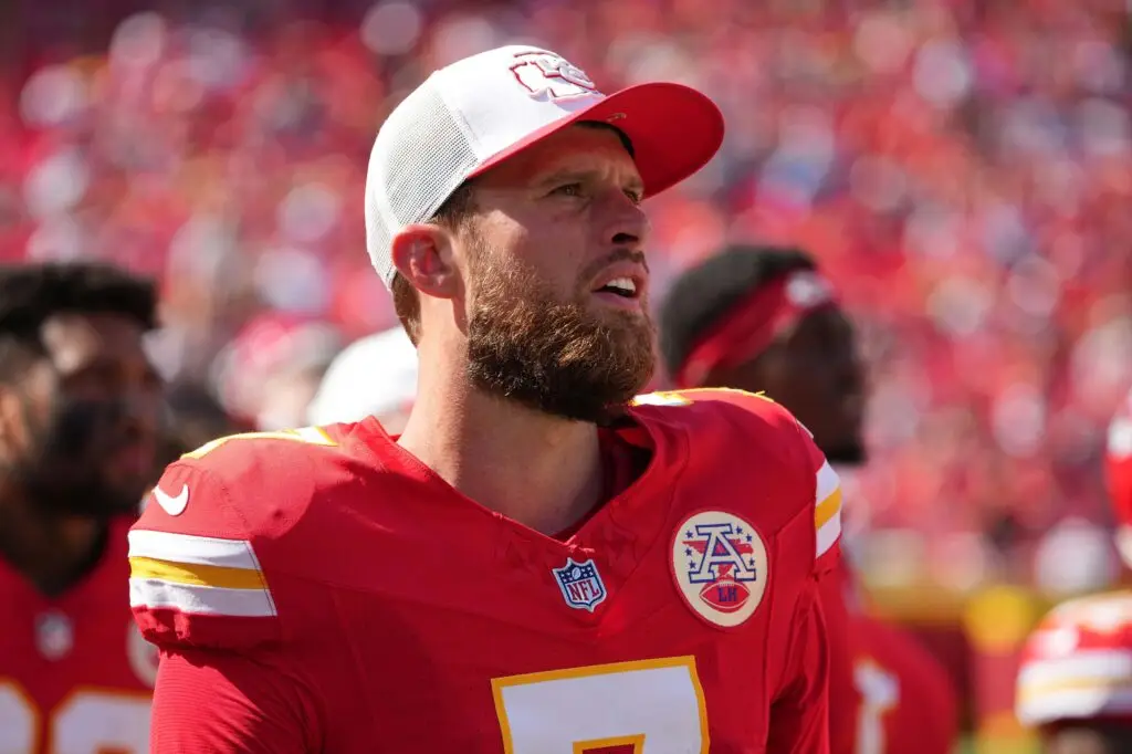 Aug 17, 2024; Kansas City, Missouri, USA; Kansas City Chiefs kicker Harrison Butker (7) on the sidelines against the Detroit Lions during the game at GEHA Field at Arrowhead Stadium. Mandatory Credit: Denny Medley-USA TODAY Sports