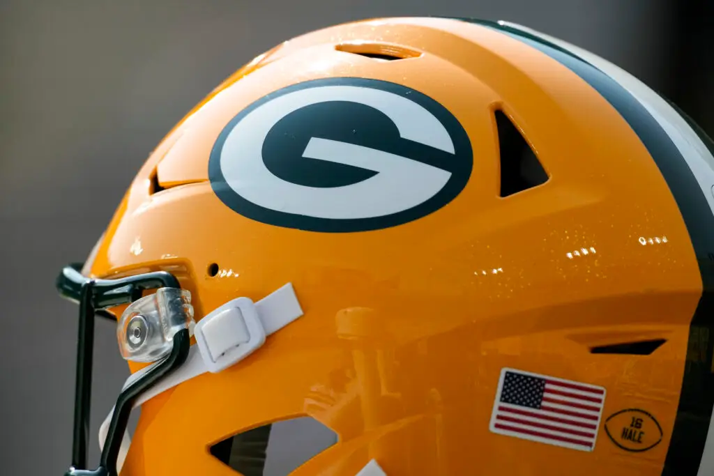 Packers' Legend Abruptly Passes Away; Fans Flood The Internet (Breaking) 3 Aug 24, 2024; Green Bay, Wisconsin, USA; General view of a Green Bay Packers helmet during warmups prior to the game against the Baltimore Ravens at Lambeau Field. Mandatory Credit: Jeff Hanisch-Imagn Images