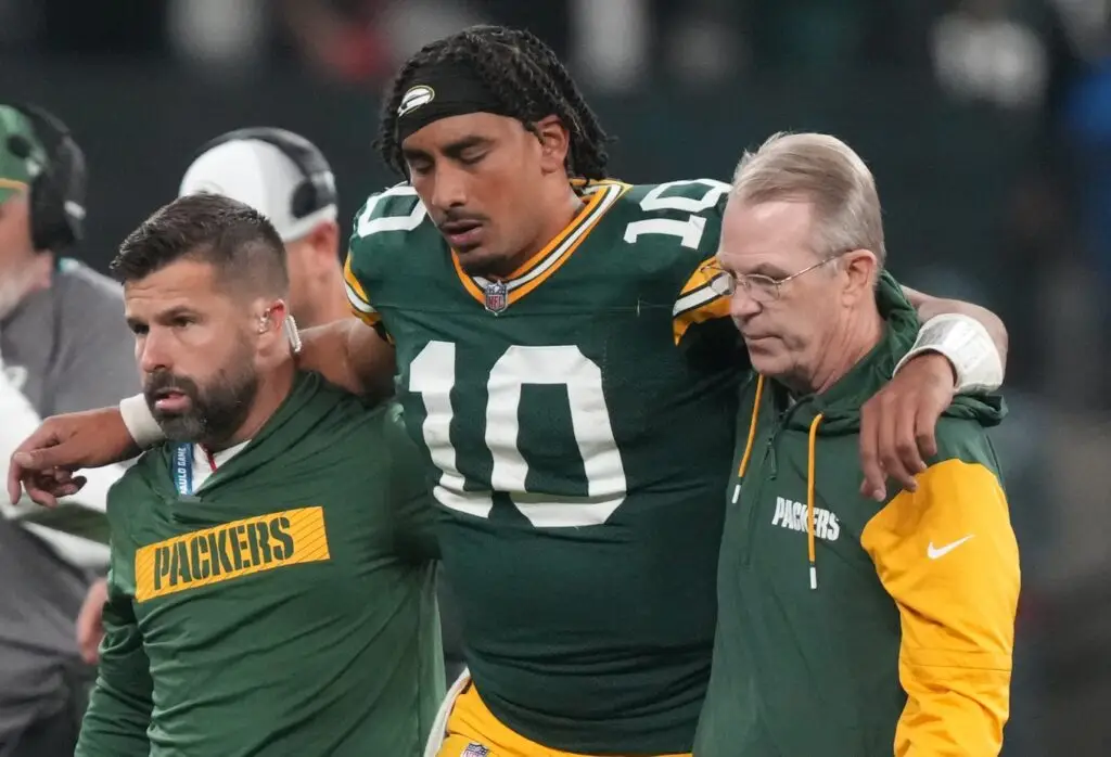 Sep 6, 2024; Sao Paulo, BRA; Green Bay Packers quarterback Jordan Love (10) is assisted off the field after an injury during the second half against the Philadelphia Eagles at Neo Quimica Arena. Mandatory Credit: Kirby Lee-Imagn Images