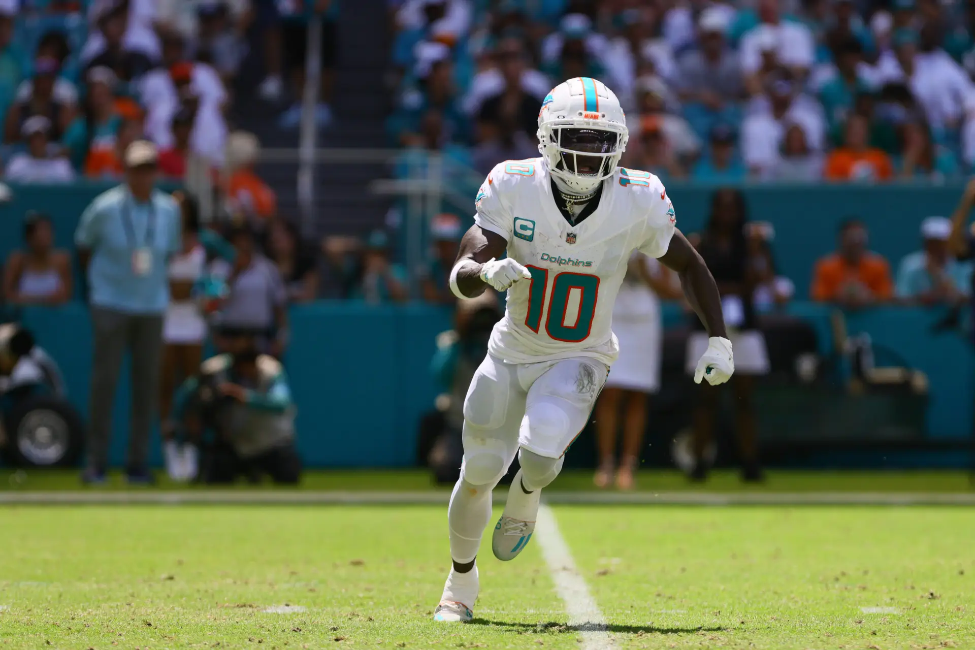 Sep 8, 2024; Miami Gardens, Florida, USA; Miami Dolphins wide receiver Tyreek Hill (10) runs on the field against the Jacksonville Jaguars during the first quarter at Hard Rock Stadium. Mandatory Credit: Sam Navarro-Imagn Images