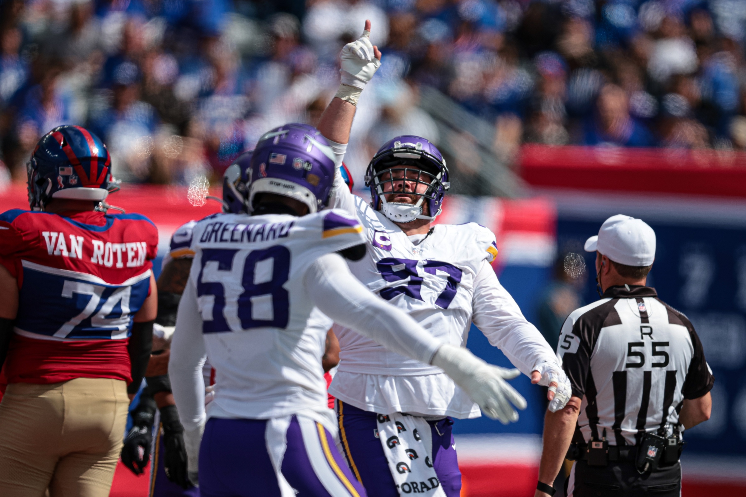 Sep 8, 2024; East Rutherford, New Jersey, USA; Minnesota Vikings defensive tackle Harrison Phillips (97) celebrates a defensive stop during the second half against the New York Giants at MetLife Stadium. Mandatory Credit: Vincent Carchietta-Imagn Images