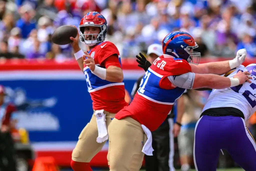 Sep 8, 2024; East Rutherford, New Jersey, USA; New York Giants quarterback Daniel Jones (8) passes the ball against the Minnesota Vikings during the second half at MetLife Stadium. Mandatory Credit: John Jones-Imagn Images