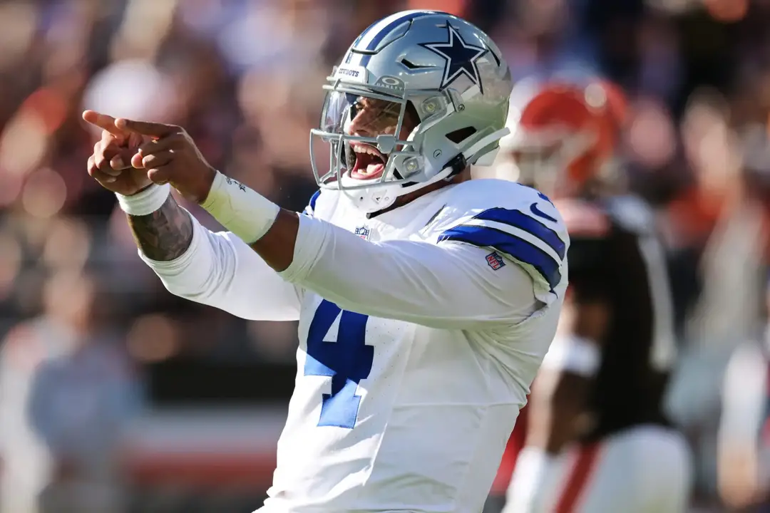 Sep 8, 2024; Cleveland, Ohio, USA; Dallas Cowboys quarterback Dak Prescott (4) celebrates after a touchdown during the first half against the Cleveland Browns at Huntington Bank Field. Mandatory Credit: Ken Blaze-Imagn Images