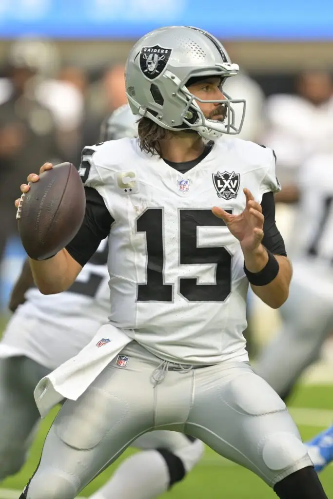 Sep 8, 2024; Inglewood, California, USA; Las Vegas Raiders quarterback Gardner Minshew (15) looks to pass in the second half against the Los Angeles Chargers at SoFi Stadium. Mandatory Credit: Jayne Kamin-Oncea-Imagn Images