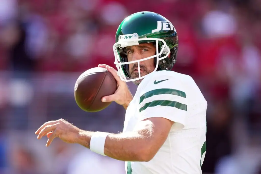 Sep 9, 2024; Santa Clara, California, USA; New York Jets quarterback Aaron Rodgers (8) warms up before the game against the San Francisco 49ers at Levi's Stadium. Mandatory Credit: Darren Yamashita-Imagn Images