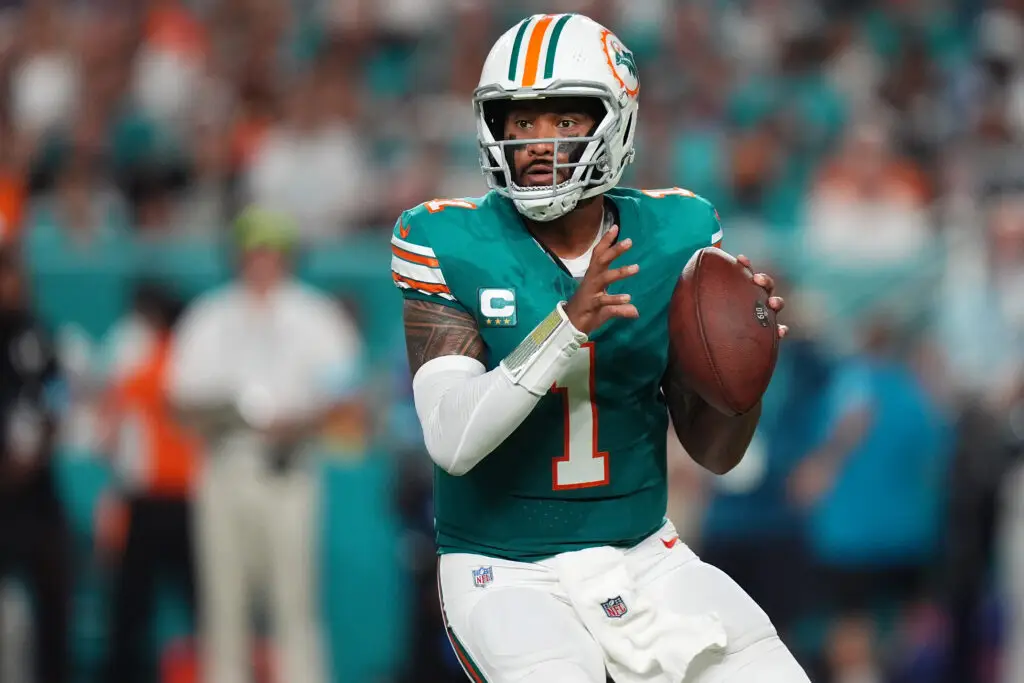 Sep 12, 2024; Miami Gardens, Florida, USA; Miami Dolphins quarterback Tua Tagovailoa (1) drops back with the ball against the Buffalo Bills during the first half at Hard Rock Stadium. Mandatory Credit: Jasen Vinlove-Imagn Images