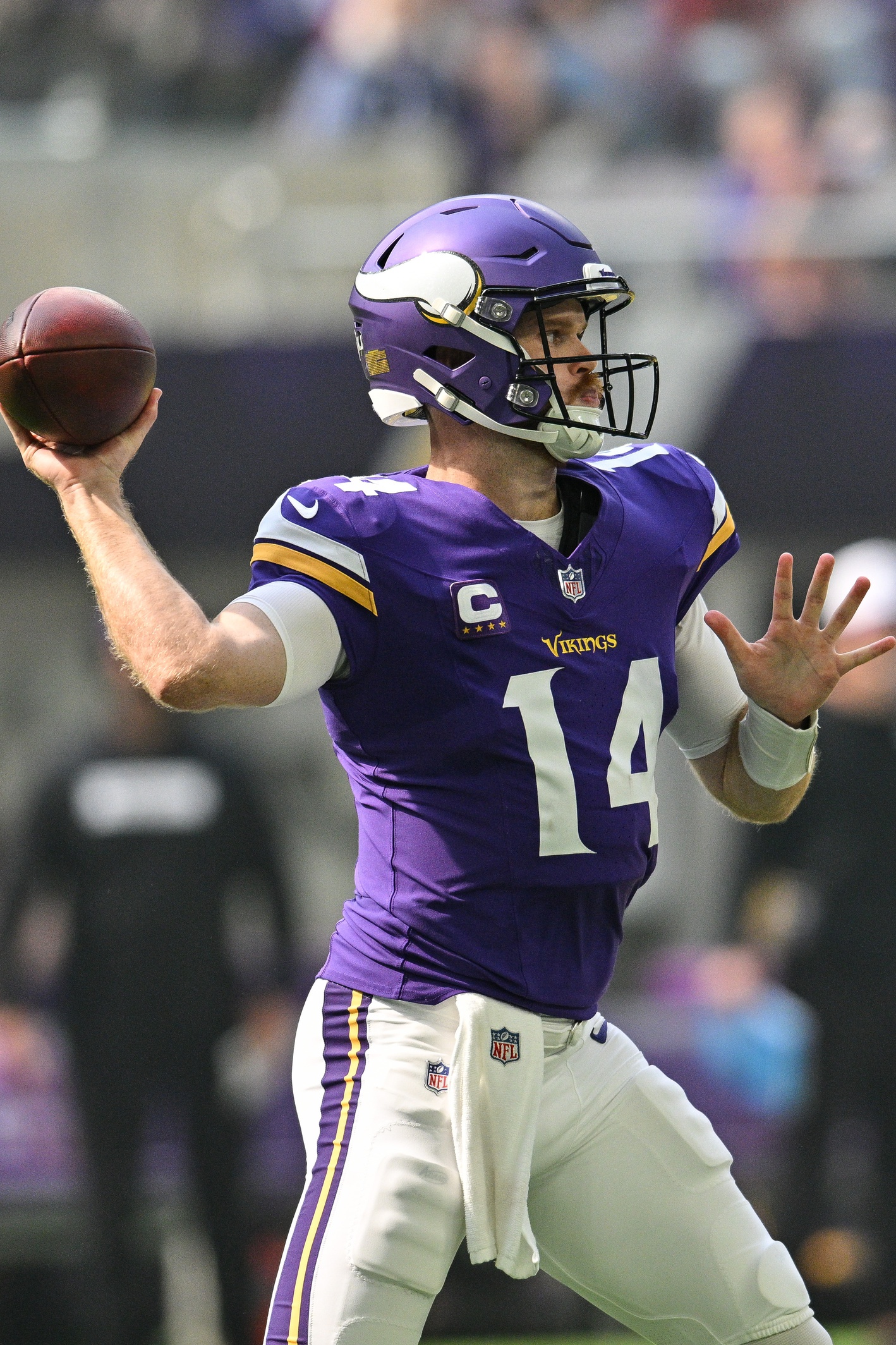 Sep 15, 2024; Minneapolis, Minnesota, USA; Minnesota Vikings quarterback Sam Darnold (14) throws a pass against the San Francisco 49ers during the first quarter U.S. Bank Stadium. Mandatory Credit: Jeffrey Becker-Imagn Images