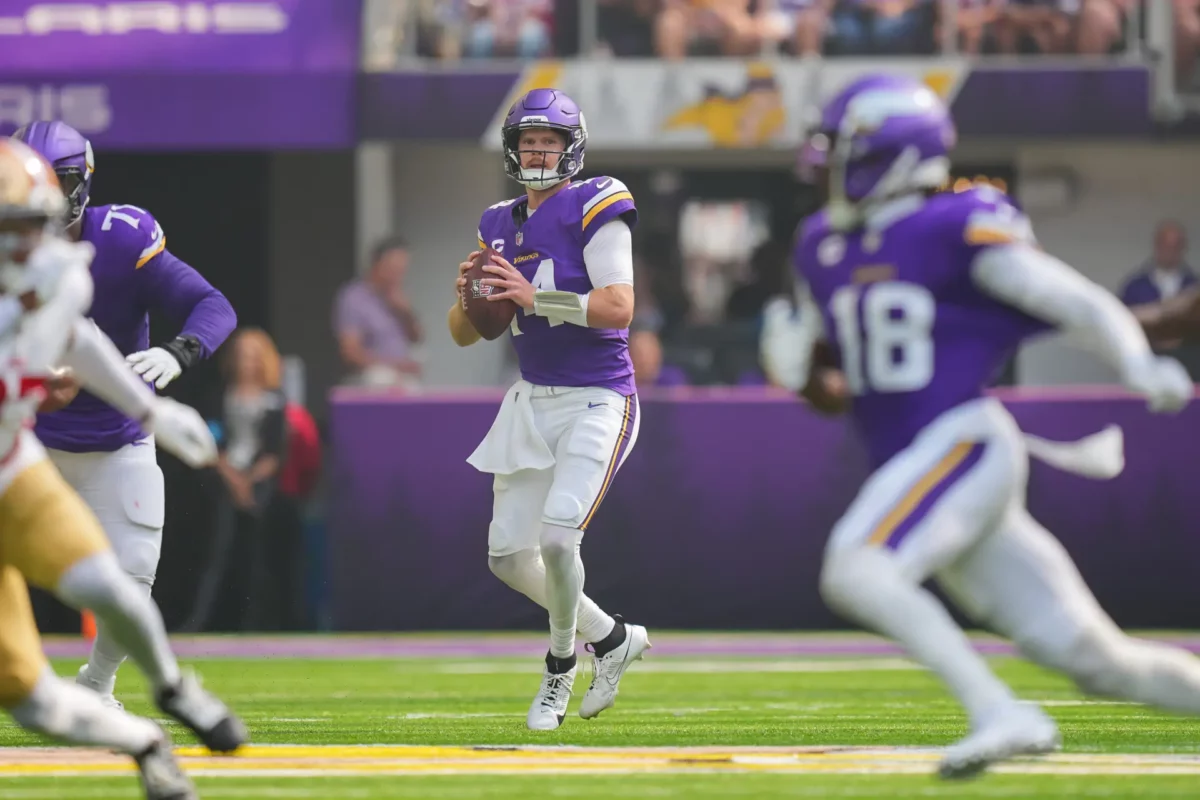 Sep 15, 2024; Minneapolis, Minnesota, USA; Minnesota Vikings quarterback Sam Darnold (14) looks to pass against the San Francisco 49ers in the first quarter at U.S. Bank Stadium. Mandatory Credit: Brad Rempel-Imagn Images