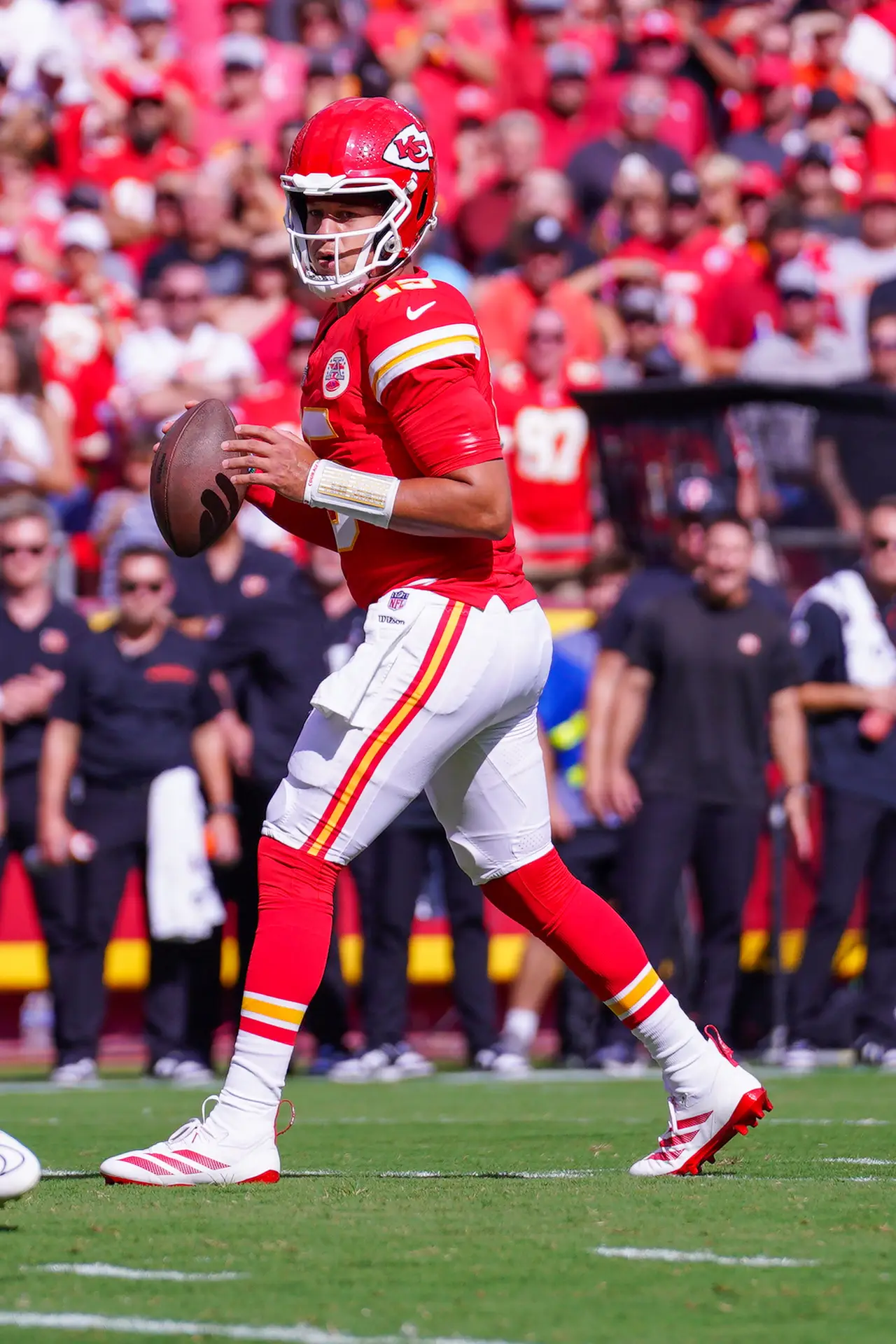 Sep 15, 2024; Kansas City, Missouri, USA; Kansas City Chiefs quarterback Patrick Mahomes (15) drops back to pass against the Cincinnati Bengals during the first half at GEHA Field at Arrowhead Stadium. Mandatory Credit: Denny Medley-Imagn Images