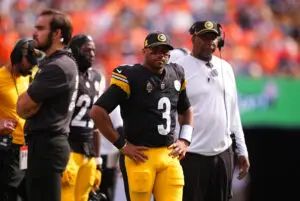 Sep 15, 2024; Denver, Colorado, USA; Pittsburgh Steelers quarterback Russell Wilson (3) during a injury time out in the second quarter against the Denver Broncos at Empower Field at Mile High. Mandatory Credit: Ron Chenoy-Imagn Images