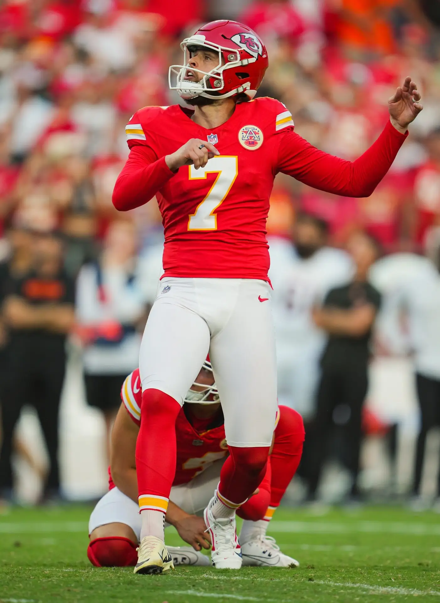 Sep 15, 2024; Kansas City, Missouri, USA; Kansas City Chiefs place kicker Harrison Butker (7) kicks a game winning field goal as time expires against the Cincinnati Bengals at GEHA Field at Arrowhead Stadium. Mandatory Credit: Jay Biggerstaff-Imagn Images