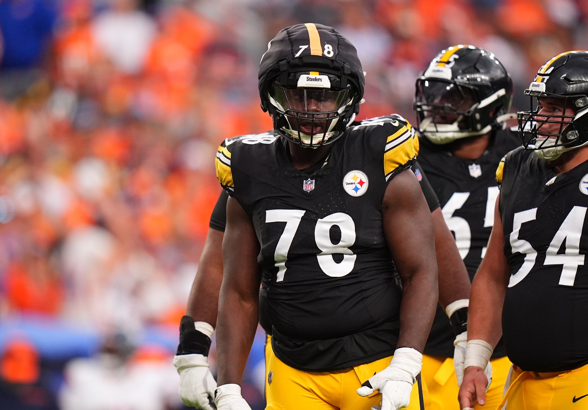 Sep 15, 2024; Denver, Colorado, USA; Pittsburgh Steelers guard James Daniels (78) wears a guardian cap in the second half against the Denver Broncos at Empower Field at Mile High. Mandatory Credit: Ron Chenoy-Imagn Images