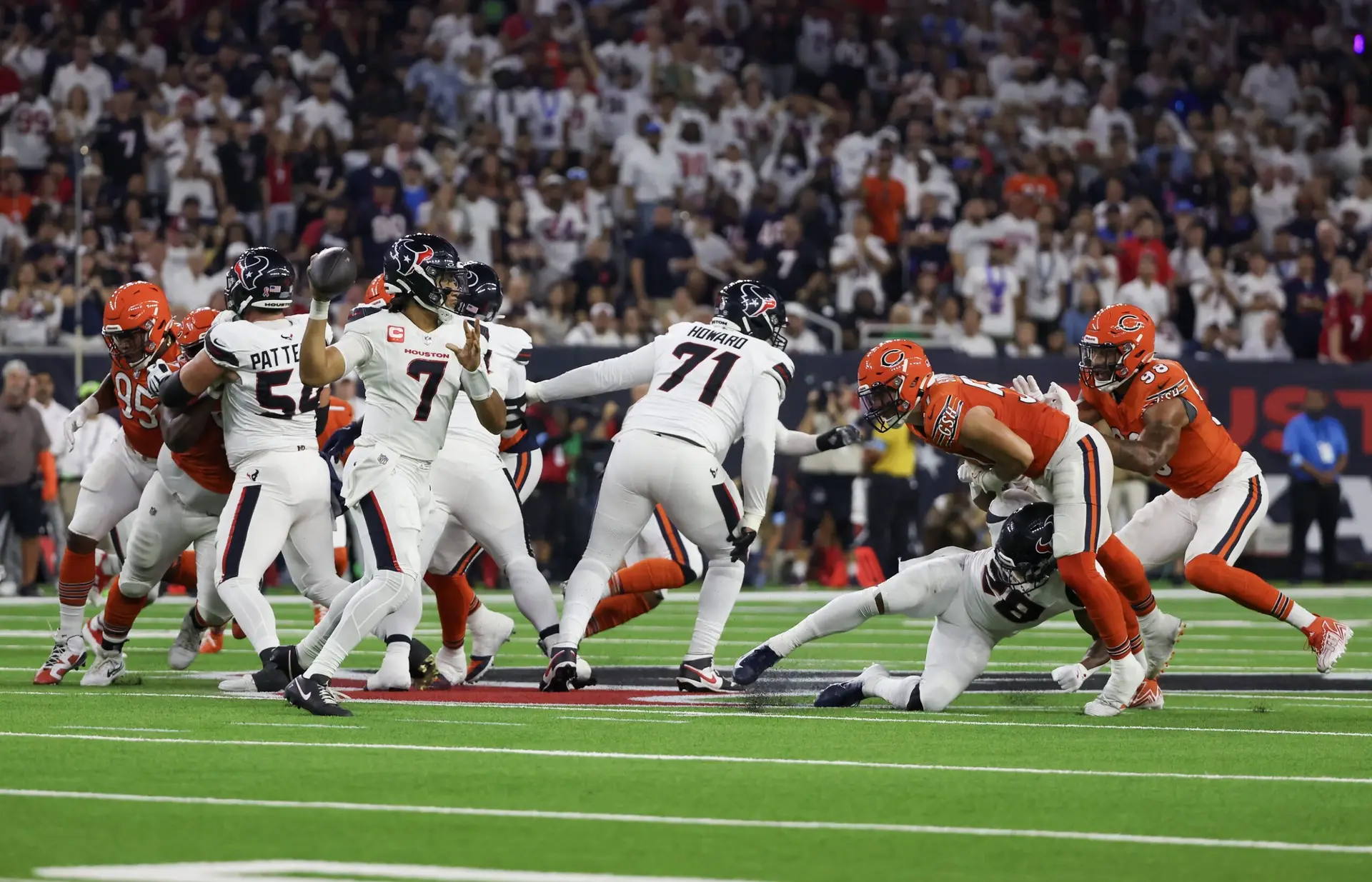 Sep 15, 2024; Houston, Texas, USA; Houston Texans quarterback C.J. Stroud (7) scrambles against the Chicago Bears in the first quarter at NRG Stadium. Mandatory Credit: Thomas Shea-Imagn Images