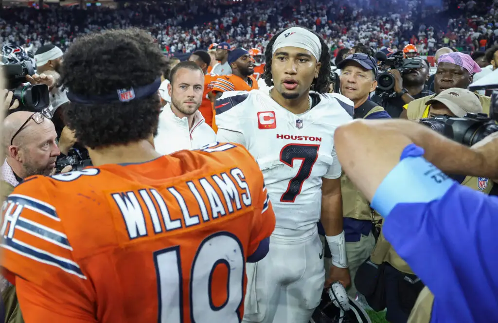 Sep 15, 2024; Houston, Texas, USA; Houston Texans quarterback C.J. Stroud (7) talks with Chicago Bears quarterback Caleb Williams (18) on the field after the game at NRG Stadium. Mandatory Credit: Troy Taormina-Imagn Images