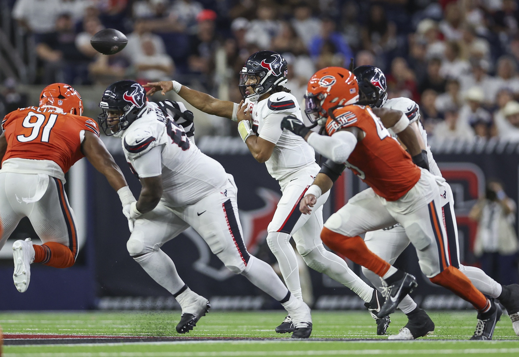 Sep 15, 2024; Houston, Texas, USA; Houston Texans quarterback C.J. Stroud (7) attempts a pass during the fourth quarter against the Chicago Bears at NRG Stadium. Mandatory Credit: Troy Taormina-Imagn Images