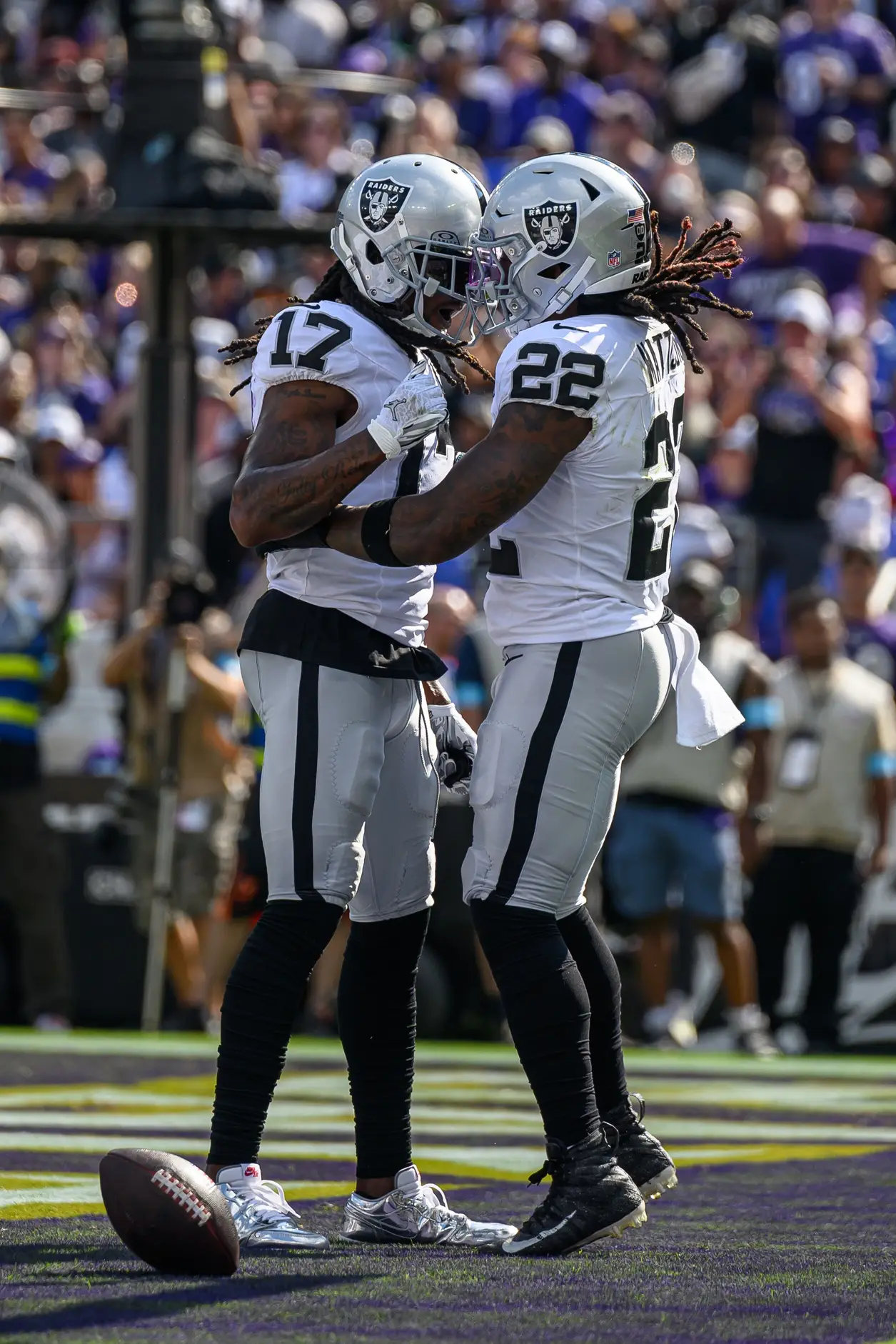 Sep 15, 2024; Baltimore, Maryland, USA; Las Vegas Raiders running back Alexander Mattison (22) scores a touchdown and celebrates with wide receiver Davante Adams (17) during the second half against the Baltimore Ravens at M&T Bank Stadium. Mandatory Credit: Reggie Hildred-Imagn Images