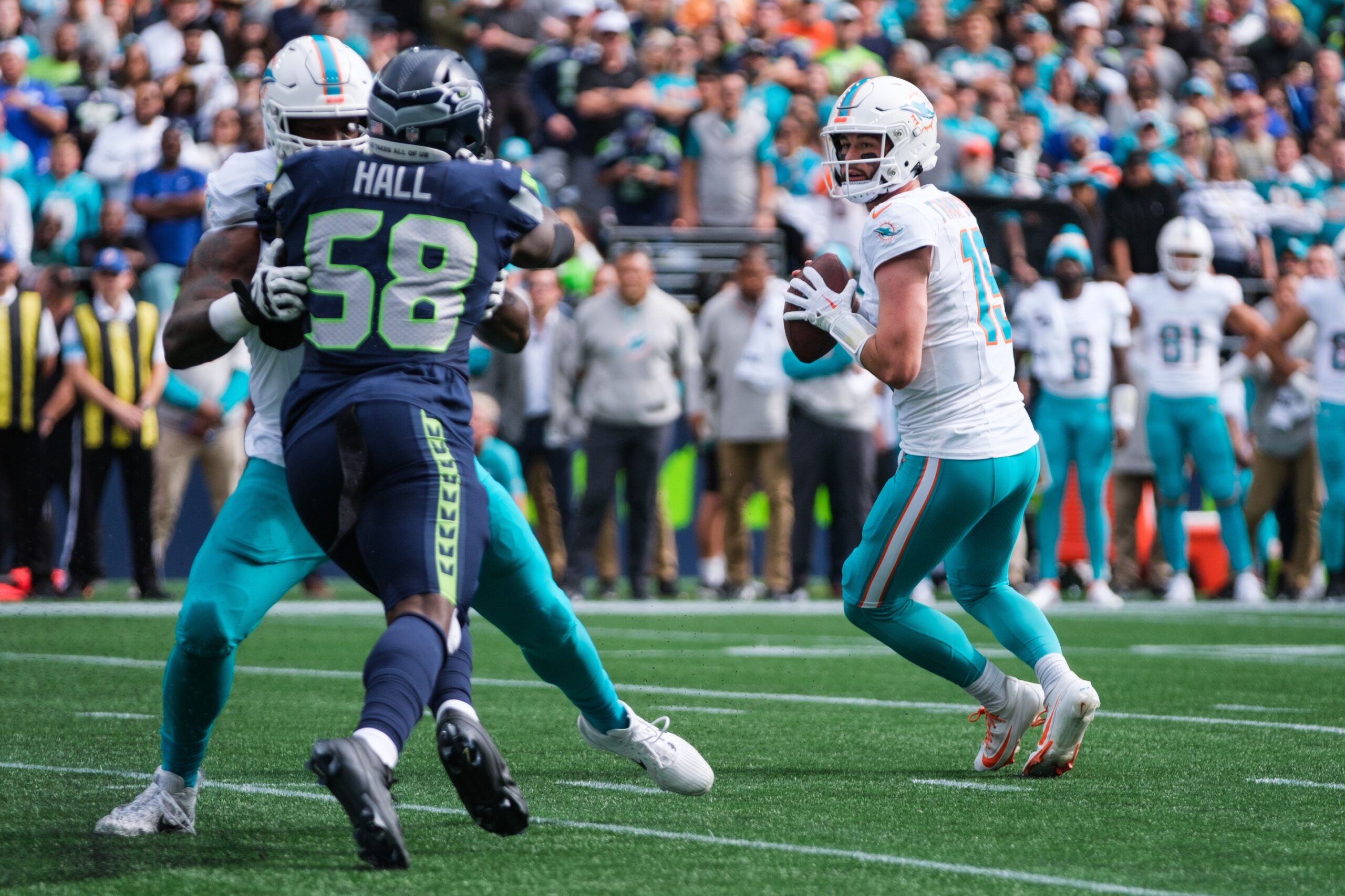 Sep 22, 2024; Seattle, Washington, USA; Miami Dolphins quarterback Skylar Thompson (19) prepares to throw the ball during the second quarter against the Seattle Seahawks at Lumen Field. Mandatory Credit: Kevin Ng-Imagn Images